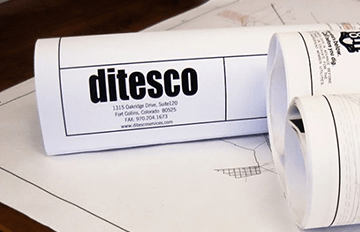 Image of rolled up paper with "ditesco" and address